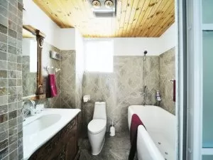 卫生间灰色瓷砖铺装效果图 按摩浴缸图片